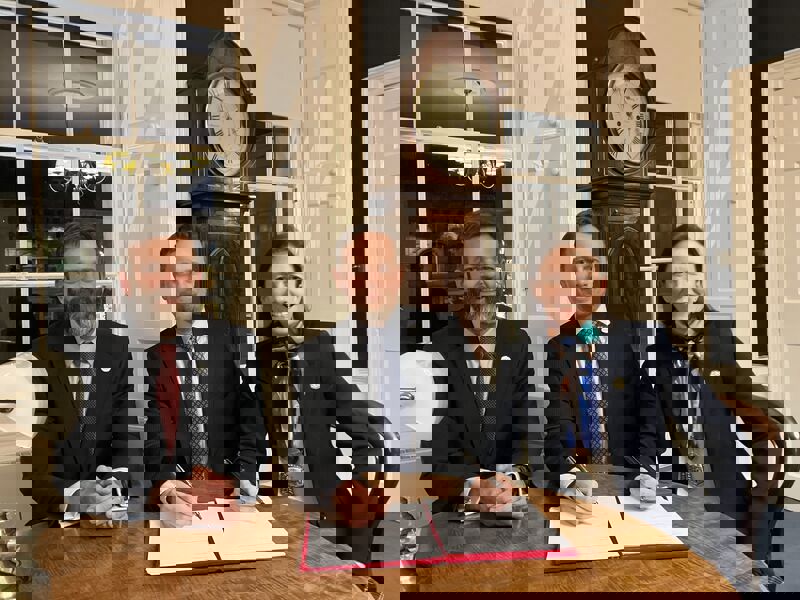 Tim Gargan from HALO signs an agreement with representatives of Royal College of Surgeons Edinburgh