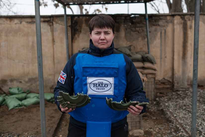 Ruth Davidson, former leader of The Scottish Conservative Party, holds a destroyed anti-tank landmine while wearing PPE in Afghanistan