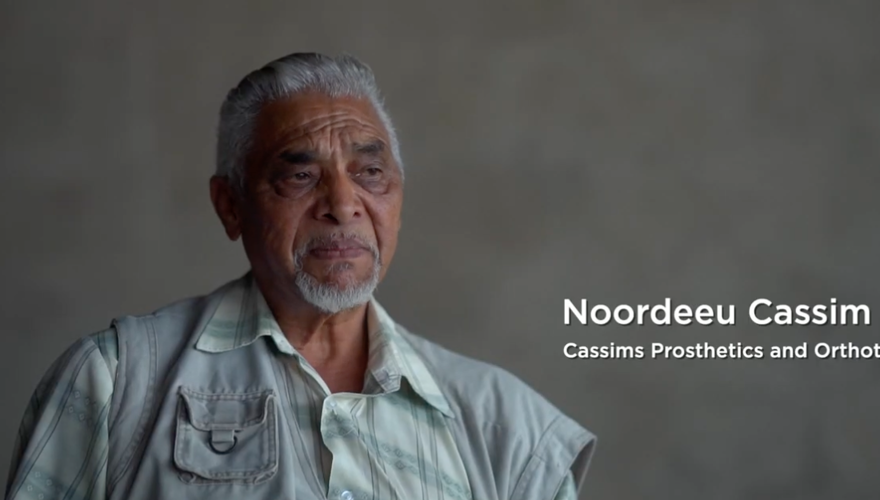 Noordeeu, from Cassims prosthetics speaks in a piece to camera