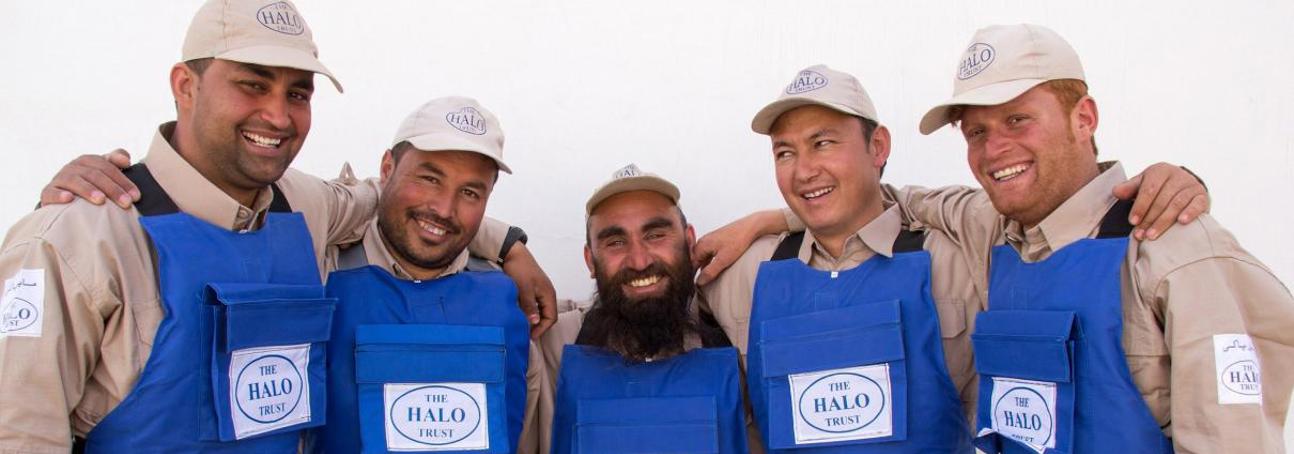 A team of dedicated deminers smile for a group photo following the clearance of districts in Herat Province, Afghanistan