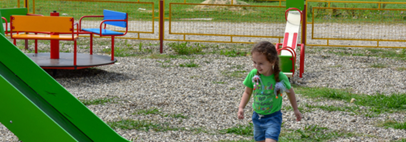 children playing by a slide in primorsky, abkhazia