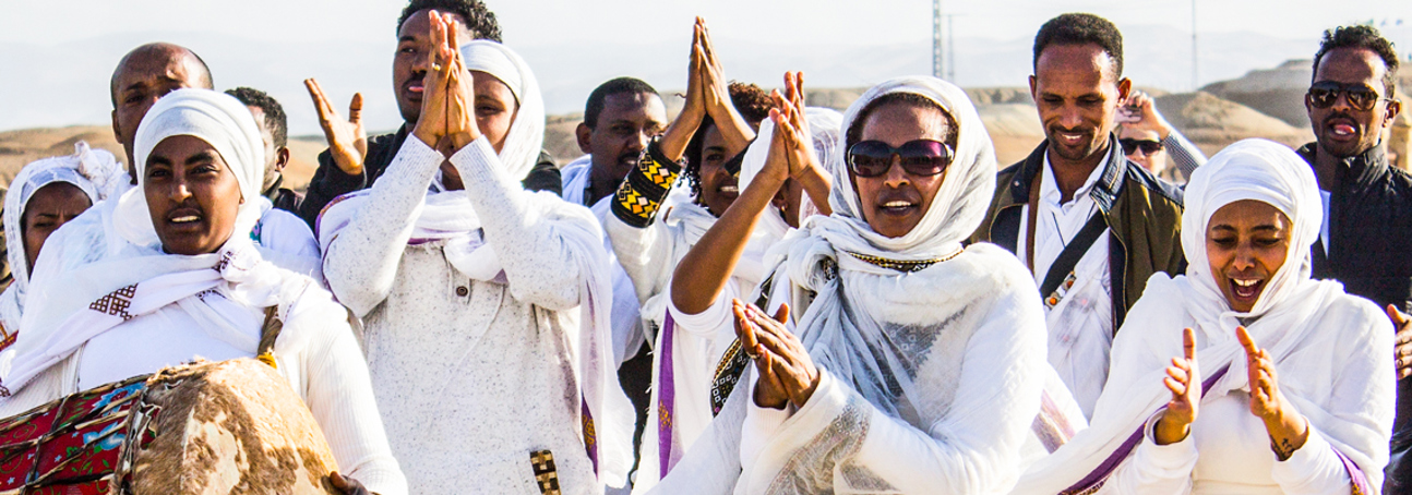 Pilgrims gathered at the site of the Baptism of Christ, following clearance completed by The HALO Trust